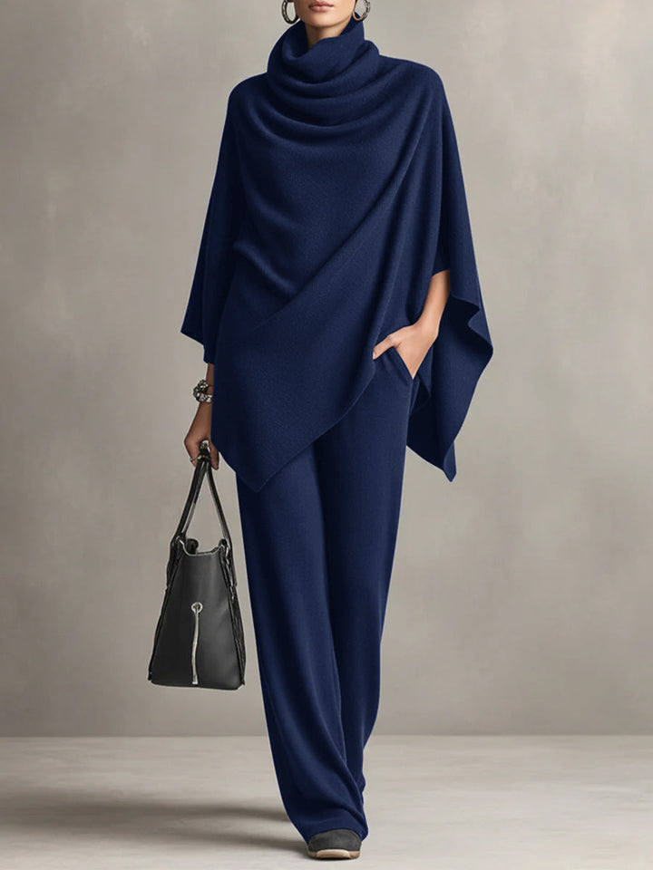 Two-piece set featuring a high-neck cape-style top and wide-leg trousers.